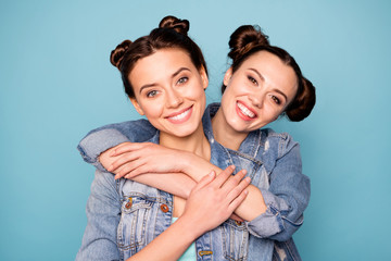 Poster - Portrait of funny charming pleasant ladies isolated feeling happiness calm having stroll promenade dressed in denim clothes on blue background