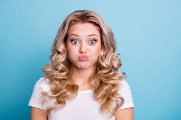 Wall Mural - Close up photo beautiful friendly her she lady comedy look joking foolish hold breath keep silence big eyes wear casual white t-shirt jeans denim clothes outfit isolated bright blue background