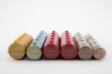 Group of coins rolls on white background. Rolls with euros.