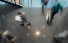 Business People Walking, Blurred By Motion Shot From A Top View
