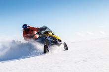 Athlete On A Snowmobile.