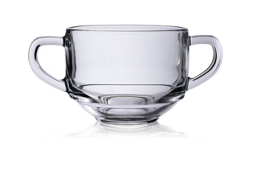 Empty glass cup with two handles for hot drinks and soups. Isolated on a white background