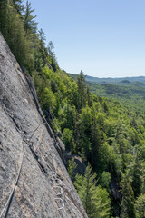 Via Ferrata Du Diable of La Diable sector at Mont Tremblant National Park is a path that goes its way along the Vache Noire rock at an altitude of 200 m