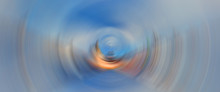 Abstract Background Of Colorful Spin Circle Radial Motion Blur.