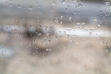 Fototapeta Dmuchawce - raindrops on the glass 