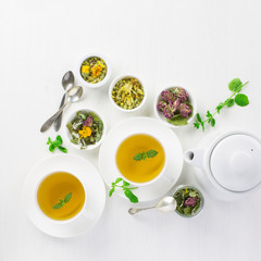 Wall Mural - cup of herbal tea, white background