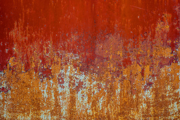 Wall Mural - Texture of old rusty metal, painted red which becames orange from rust.