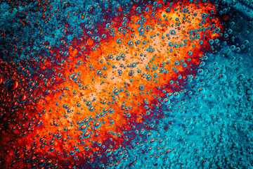 Wall Mural - Freshness. Volcano eruption in the bottom of the ocean. Blue and orange abstract texture photo.