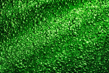 Wall Mural - Light beam rays through three dimensional green fluid with transparent air bubbles.