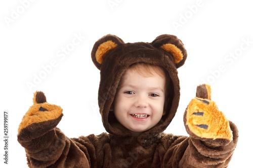 Fotografía Child in a christmas carnival bear costume isolated on white with copy space, carnival