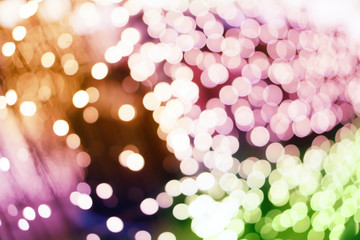 Wall Mural - Blurred and bokeh of colorful led lighting in full screen and black background.