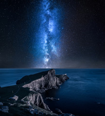 Wall Mural - milky way over neist point lighthouse, isle of skye, scotland