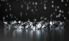 Group Of Clear Diamonds And Light Bokeh Background 3d Rendering.