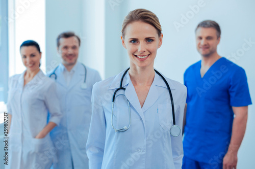 Fotografía Positive delighted doctor posing on camera