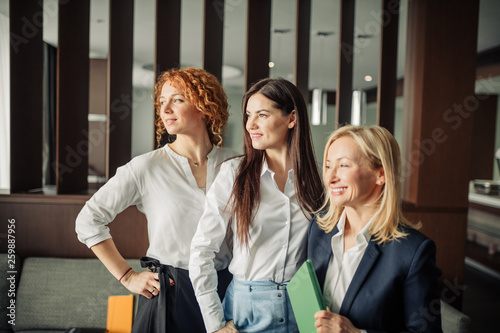 Portrait Of Three Caucasian Business Women With Different