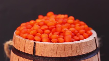 Wall Mural - Lentil red close-up in a barrel