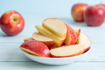 Wall Mural - fresh red apples sliced bowl