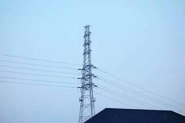 Residential area dusk sky and power tower 