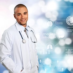 Wall Mural - Portrait of  doctor  with arms crossed in medical office