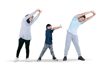 Sticker - Little boy doing hands stretch with his parents