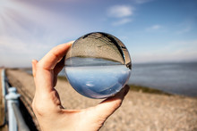 Morecambe Bay, Lancashire, As Seen Through A Crystal Photography Ball Held By A Female Hand - Refraction Crystal Ball Photography