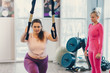 © MZaitsev - Fat woman works out in gym to lose weight
