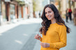 © bnenin - Urban portrait of a beautiful smiling young woman.