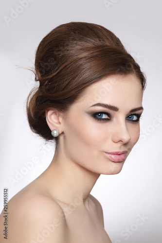 Vintage Style Portrait Of Young Beautiful Woman With Fancy Hair