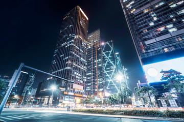 Urban Nightscape Architecture Street and Fuzzy Car Lights..