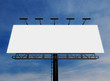 © pabijan - 3D rendering of blank billboard (empty advertisement) with clouds. Empty mockup template