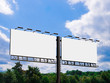 © pabijan - 3D rendering of blank billboard (empty advertisement) isolated on white background - mock up template