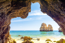 Rocky Arch On Sandy Beach Praia Do Camilo In Lagos, Algarve, Portugal