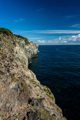 Wall Mural - seascape with cliff  in terceria, view of the volcano's cliff in terceira. seascape in azores, portugal.