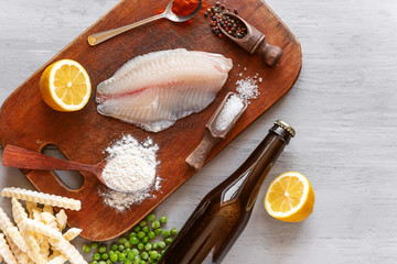 set of ingredients for the preparation of the classic English dish fish and chips