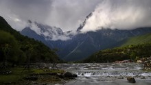 4k Timelapse Of Rainy Clouds Into The Valley At Blue Moon Lake, Lijiang, China During Autumn.