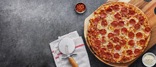 Pepperoni Pizza On Wooden Serving Board Shot Top Down With Copy Space Composition