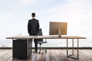 Businessman in modern office interior