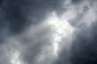 © Sondem - Dramatic dark cloudy sky  background with  beautiful sunbeam