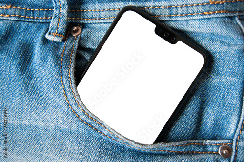Fotografía Smartphone with isolated white screen in a denim jeans pocket