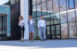 © Drpixel - Group of business people walking outdoor in front of an office building