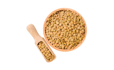 Green lentils in wooden bowl and scoop isolated on white background. nutrition. bio. natural food ingredient.