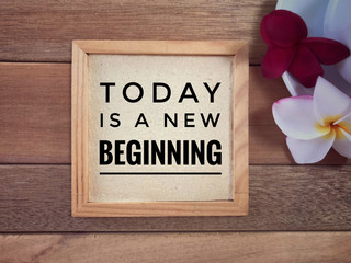 Wall Mural - Motivational and inspirational quote - Today Is A New Beginning written on a framed paper.