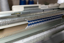 Manual Knitting Machine. A Knitting Machine Is A Device Used To Create Knitted Fabrics