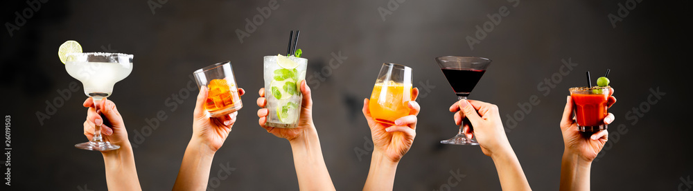 Hands holding classic cocktails on rustic background - obrazy, fototapety, plakaty 