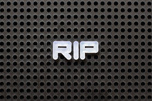 Black Color Pegboard With White Letter In Word RIP (abbreviation Of Rest In Peace)
