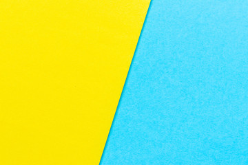 Abstract yellow and light blue color paper textured background with copy space for design and decoration