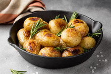 Fried (baked) Whole Small Potatoes With Rosemary And Salt In A Frying Pan, Ruddy Crust, Appetizing Food