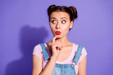 Close up photo beautiful amazing she her lady two buns look side empty space wait hear new rumours chatterbox wear casual t-shirt jeans denim overalls clothes isolated purple violet background