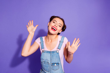 Wall Mural - Close up photo beautiful amazing yell she her lady buns eyes closed hold arms hands raised sale discount shopping wear casual t-shirt jeans denim overalls clothes isolated purple violet background