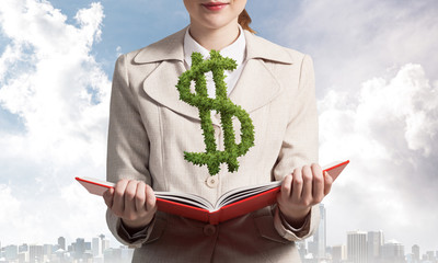 Sticker - Businesswoman with green plant shaped dollar